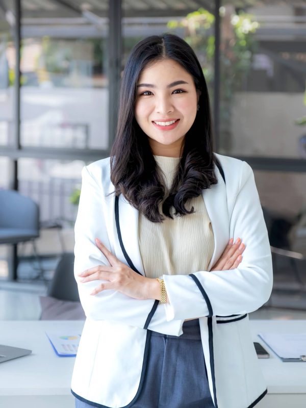 business-woman-joyful-smiling-bookkeeper-s-standing-in-the-working-office.jpg